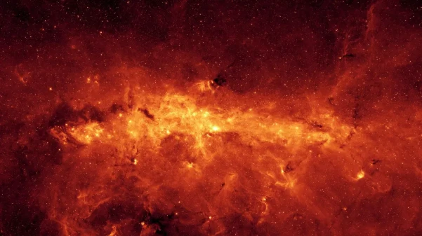 Hình ảnh qua kính viễn vọng không gian Spitzer về trung tâm Dải Ngân hà, nơi các hố đen cổ đại và các ngôi sao chết trú ngụ. (Nguồn: livescience.com)