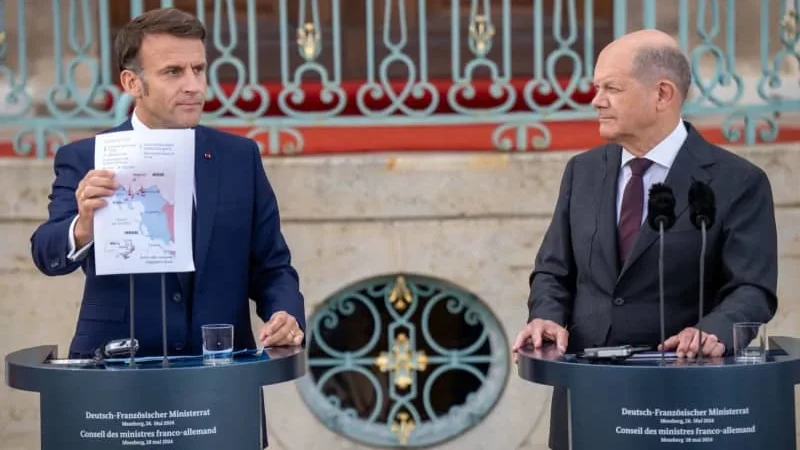 Tổng thống Pháp Emmanuel Macron (trái) và Thủ tướng Đức Olaf Scholz. (Nguồn: dpa)