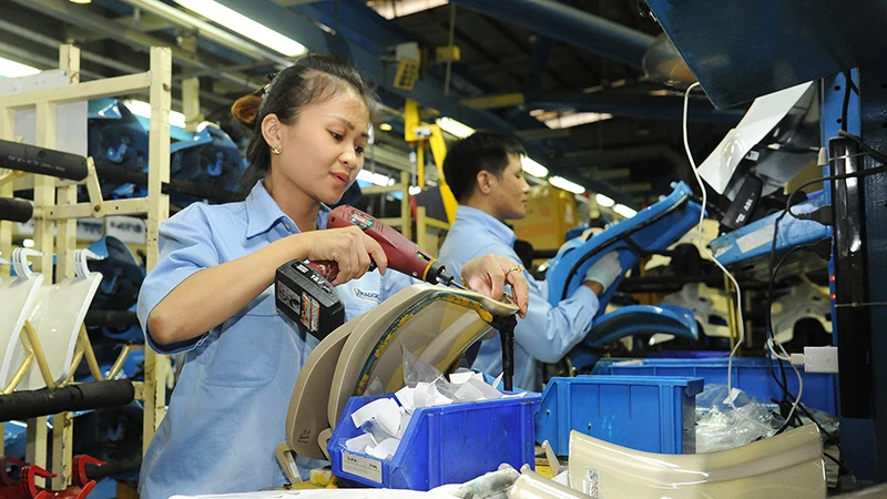 Sản xuất và lắp ráp xe máy tại Công ty TNHH Piaggio Việt Nam (Khu công nghiệp Bình Xuyên, tỉnh Vĩnh Phúc). Ảnh | TRẦN HẢI
