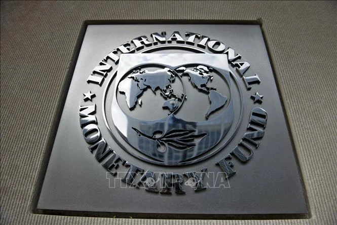Biểu tượng Quỹ Tiền tệ quốc tế (IMF) tại Washington DC, Mỹ. (Ảnh: AFP/TTXVN)