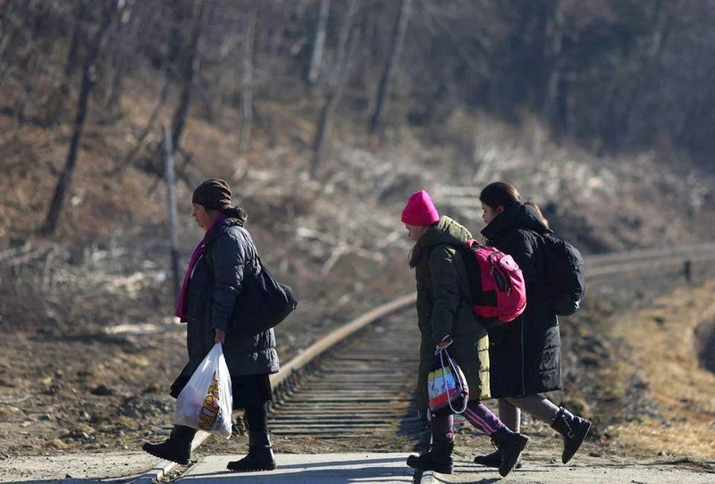 Người tị nạn Ukraine rời đất nước đến Ba Lan lánh nạn, Kroscienko, Ba Lan, ngày 22/3/2022. (Ảnh minh họa: Reuters)