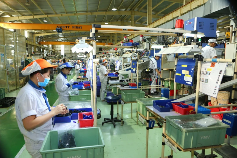 Kinh tế Việt Nam phục hồi nhanh hơn dự kiến trong nửa đầu năm 2022 và dự báo sẽ tiếp tục phục hồi trong 6 tháng cuối năm nay. (Ảnh minh họa: THÀNH ĐẠT)