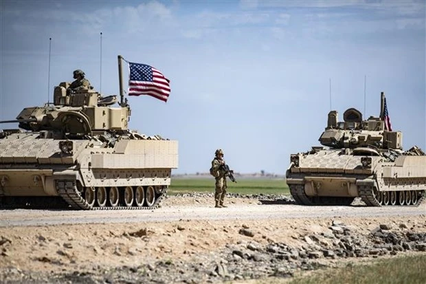 Binh sĩ Mỹ tuần tra tại Qamishli, tỉnh Hasakeh, đông bắc Syria. (Ảnh: AFP/TTXVN)