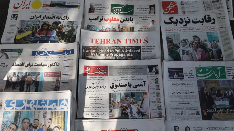 Báo chí Iran đưa tin về cuộc bầu cử tổng thống, Tehran, Iran, ngày 29/6/2024. (Ảnh: WANA/Reuters) 