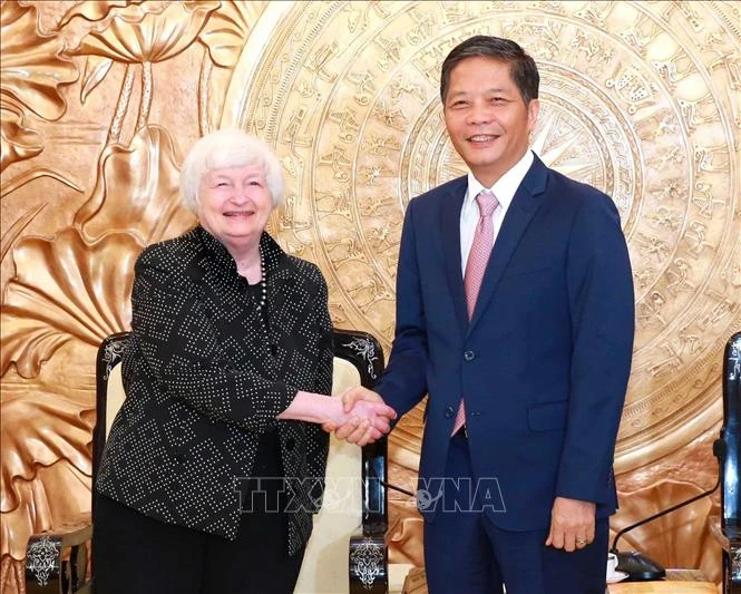 Đồng chí Trần Tuấn Anh, Ủy viên Bộ Chính trị, Trưởng Ban Kinh tế Trung ương tiếp Bộ trưởng Tài chính Hoa Kỳ Janet Yellen thăm và làm việc tại Việt Nam. (Ảnh: TTXVN) 
