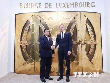 Thủ tướng Chính phủ Phạm Minh Chính thăm Sở Giao dịch chứng khoán Luxembourg. (Ảnh: TTXVN)