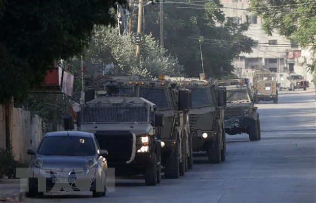 Xe quân sự Israel được triển khai tại thành phố Jenin, Bờ Tây, ngày 3/7. (Ảnh: THX/TTXVN)