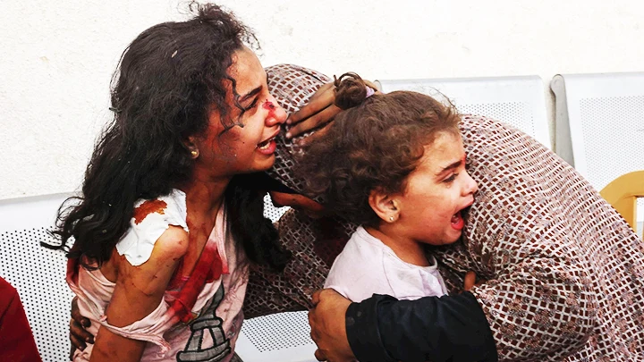 Trẻ em trong cuộc xung đột ở Dải Gaza. Ảnh: AFP