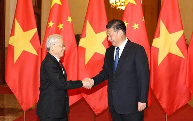 Tổng Bí thư, Chủ tịch nước Trung Quốc Tập Cận Bình đón Tổng Bí thư Nguyễn Phú Trọng trong chuyến thăm Trung Quốc hồi tháng 1/2017. (Ảnh: TTXVN)