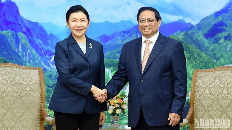 Thủ tướng Phạm Minh Chính tiếp Bộ trưởng Tư pháp Trung Quốc Hạ Vinh. (Ảnh: TRẦN HẢI)