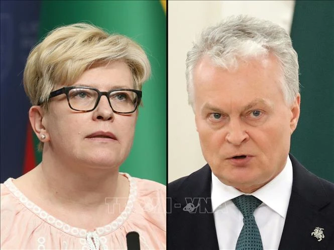 Đương kim Tổng thống Litva Gitanas Nauseda (phải) và Thủ tướng Ingrida Simonyte (trái), ngày 26/5. Ảnh: AFP/TTXVN