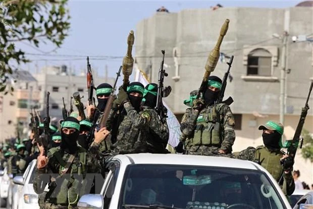 Các tay súng thuộc lữ đoàn Ezz-Al Din Al-Qassam, cánh vũ trang của Hamas, tại Rafah ở Dải Gaza ngày 28/5/2021. (Ảnh: AFP/ TTXVN)