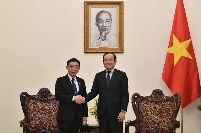 Phó Thủ tướng Chính phủ Trần Lưu Quang tiếp Bộ trưởng Bộ Nội vụ Lào Thongchanh Manixay. Ảnh: VGP