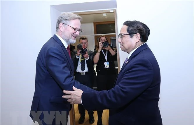 Thủ tướng Phạm Minh Chính gặp Thủ tướng Cộng hòa Séc Petr Fiala bên lề Hội nghị cấp cao ASEAN-EU tại Brussels, Vương quốc Bỉ, chiều 14/12/2022. (Ảnh: TTXVN)