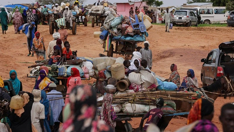 Nhiều người Sudan phải chạy tị nạn do xung đột. (Ảnh REUTERS)