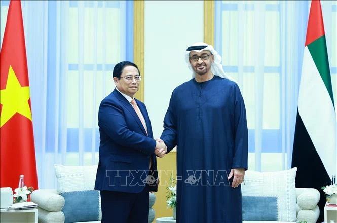 Thủ tướng Chính phủ Phạm Minh Chính và Tổng thống UAE Sheikh Mohammed bin Zayed Al Nahyan. (Ảnh: Dương Giang/TTXVN)