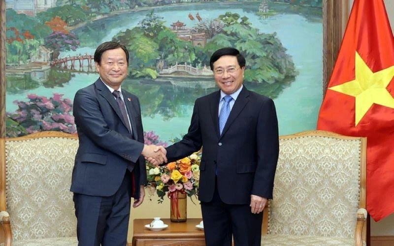 Phó Thủ tướng Thường trực Chính phủ Phạm Bình Minh tiếp Phó Chủ tịch điều hành cấp cao Cơ quan Hợp tác quốc tế Nhật Bản (JICA) Junichi Yamada. Ảnh: VGP