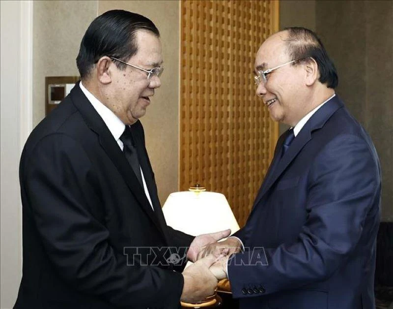 Chủ tịch nước Nguyễn Xuân Phúc gặp Thủ tướng Campuchia Samdech Techno Hun Sen. (Ảnh: Thống Nhất/TTXVN)