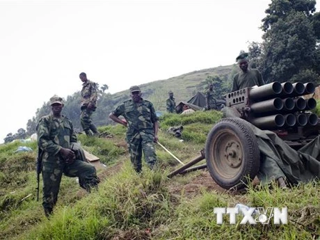 Các tay súng M23 gác tại Bunagana, CHDC Congo. (Ảnh: AFP/ TTXVN)