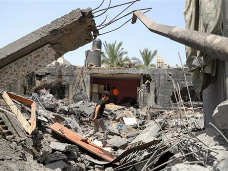 Những ngôi nhà bị phá hủy sau cuộc không kích tại Gaza ngày 12/5/2023. (Ảnh: THX/TTXVN)
