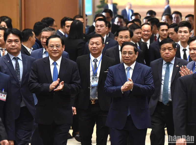 Thủ tướng Phạm Minh Chính và Thủ tướng Lào Sonexay Siphandone dự Hội nghị hợp tác đầu tư Việt Nam-Lào 2024 (Ảnh: TRẦN HẢI) 