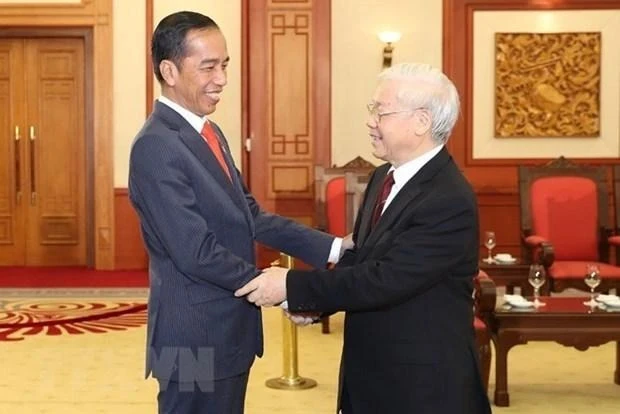 Tổng Bí thư Nguyễn Phú Trọng đón tiếp Tổng thống Indonesia Joko Widodo trong chuyến thăm Việt Nam, tháng 9/2018. (Ảnh: TTXVN)