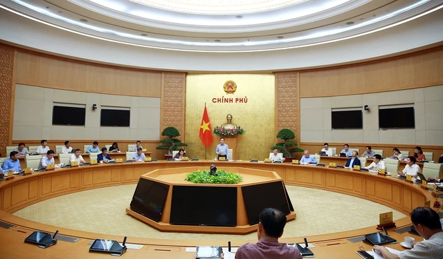 Phó Thủ tướng Trần Lưu Quang chủ trì cuộc họp với 17 bộ, cơ quan Trung ương về tình hình giải ngân vốn đầu tư công. (Ảnh: Báo điện tử Chính phủ)