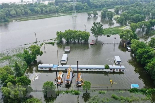 Cảnh ngập lụt tại tỉnh Liêu Ninh, Trung Quốc, ngày 4/8 vừa qua. (Ảnh: AFP/TTXVN)