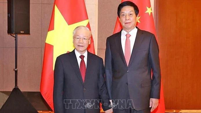 Tổng Bí thư Nguyễn Phú Trọng hội kiến Chủ tịch Quốc hội Trung Quốc Lật Chiến Thư. (Ảnh: TTXVN)