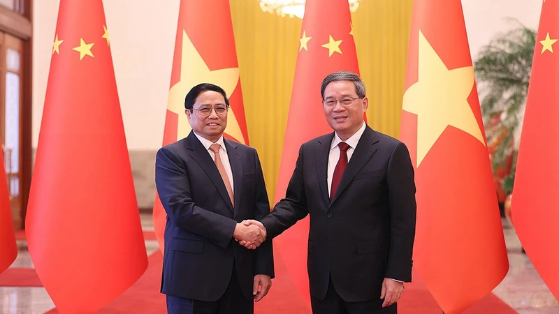 Thủ tướng Trung Quốc Lý Cường và Thủ tướng Phạm Minh Chính. (Ảnh: NHẬT BẮC)