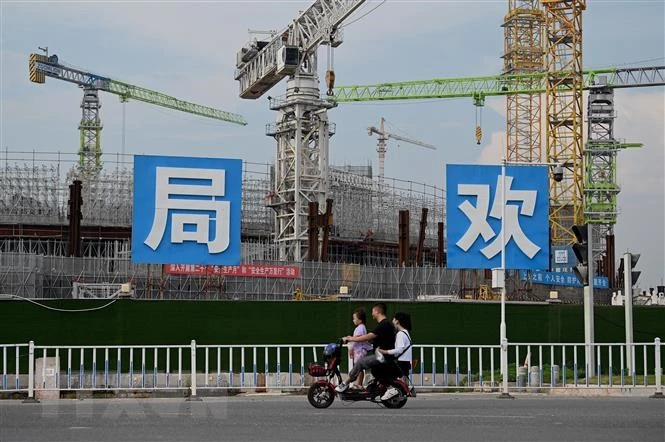 Một công trình xây dựng của Tập đoàn Bất động sản Evergrande ở Quảng Châu, tỉnh Quảng Đông, Trung Quốc, năm 2021. (Ảnh: AFP/TTXVN)