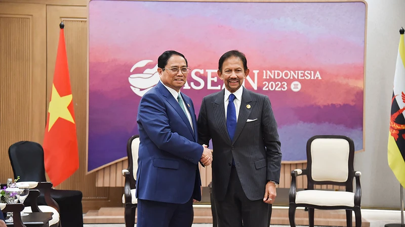 Thủ tướng Phạm Minh Chính và Quốc vương Brunei Darussalam Sultan Haji Hassanal Bolkiah. (Ảnh: TUẤN ANH)