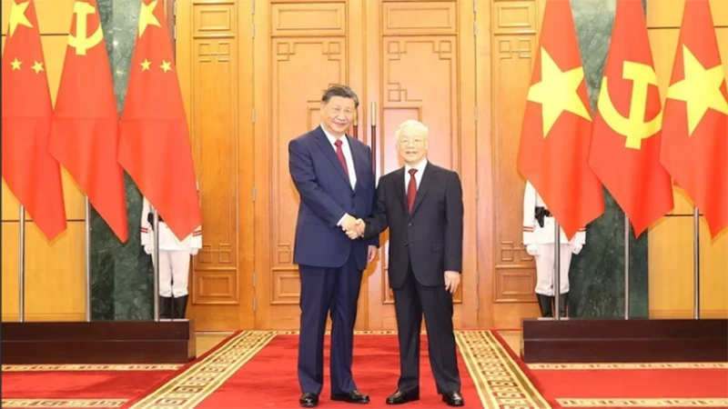 Tổng Bí thư Nguyễn Phú Trọng và Tổng Bí thư, Chủ tịch Trung Quốc Tập Cận Bình. (Ảnh: TTXVN)