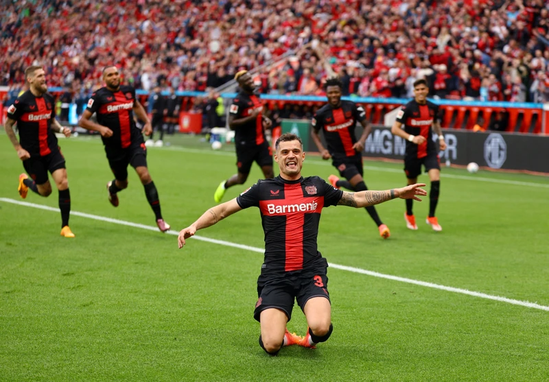 Bayer Leverkusen giữ vững kỷ lục bất bại. (Ảnh: Reuters)