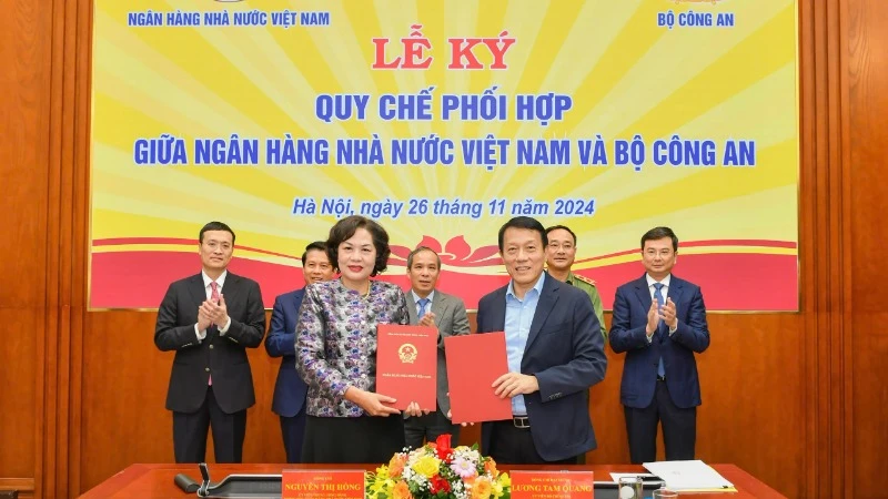 Lễ ký quy chế phối hợp giữa Ngân hàng Nhà nước Việt Nam và Bộ Công an.