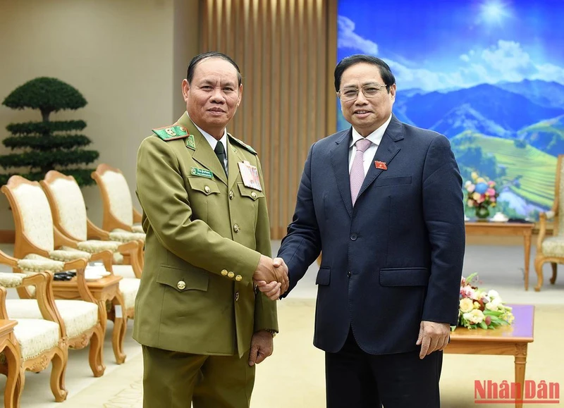 Thủ tướng Phạm Minh Chính tiếp Đại tướng Vilay Lakhamphong, Ủy viên Bộ Chính trị, Phó Thủ tướng, Bộ trưởng Công an Lào. (Ảnh: Trần Hải)