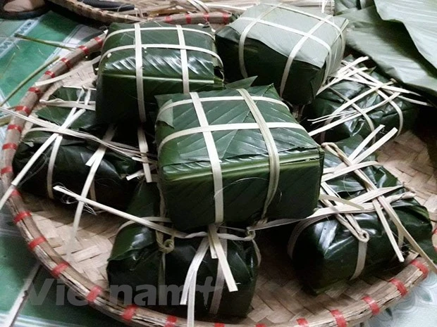 Bánh chưng là một thực phẩm quen thuộc ngày Tết. (Ảnh: PV/Vietnam+)