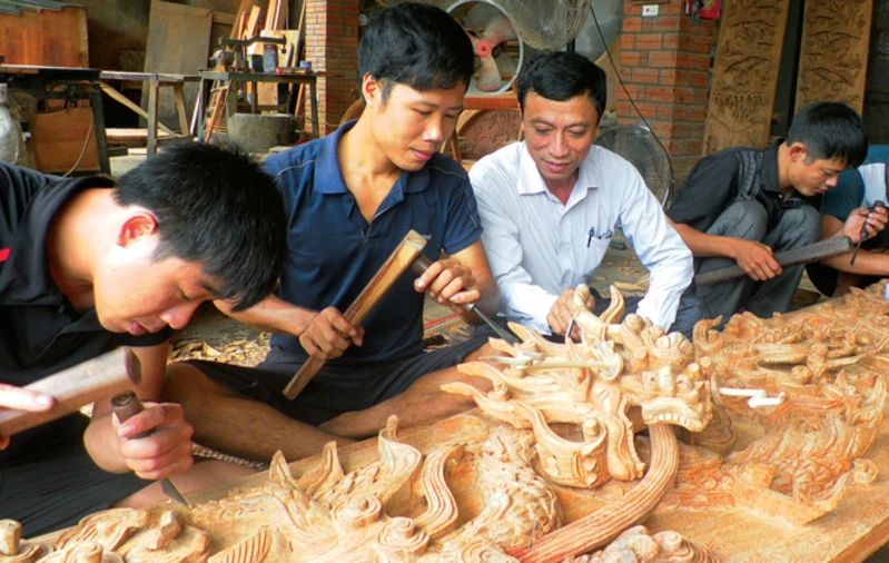 Nghề mộc thủ công tại xã Chàng Sơn, huyện Thạch Thất (Hà Nội).