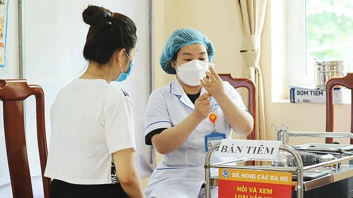 Tiêm phòng vaccine Covid-19. Ảnh: NAM ANH