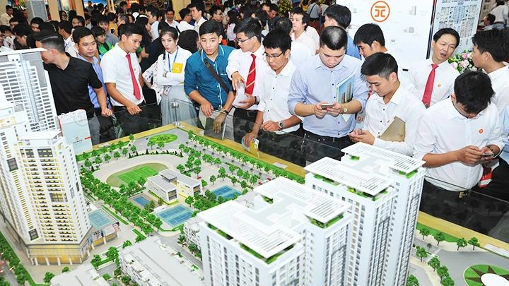 Nghị định 65 được kỳ vọng sẽ sớm hỗ trợ nhu cầu vốn của thị trường bất động sản. Ảnh: SONG ANH