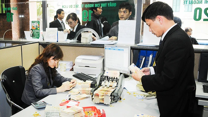 Các hoạt động tài chính đã đạt được nhiều tiến bộ. Ảnh: NGUYỆT ANH