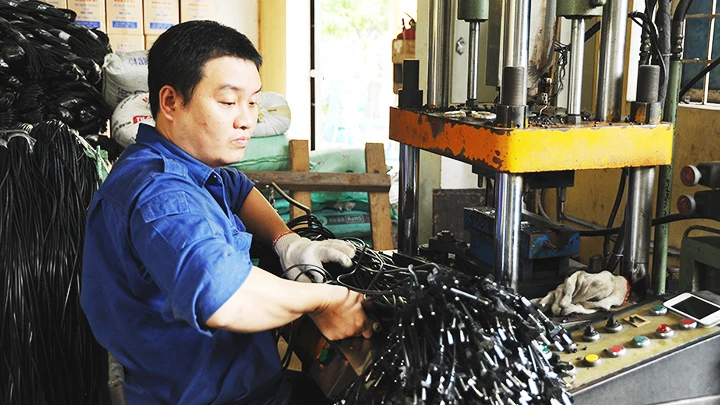 Các cơ chế chính sách phát triển công nghiệp hỗ trợ đã được triển khai rộng khắp đến các doanh nghiệp. Ảnh: SONG ANH