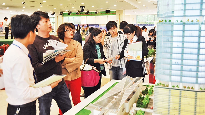 Bất động sản là một trong ba nhóm có tỷ lệ nợ xấu cao. Ảnh: NGUYỆT ANH
