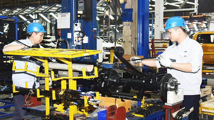 Dây chuyền sản xuất và lắp ráp ô-tô tại Nhà máy sản xuất, lắp ráp ô-tô Ford Việt Nam. Ảnh: TRẦN HẢI