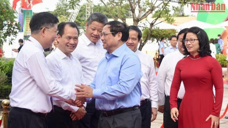 Thủ tướng Phạm Minh Chính dự Chương trình Hành trình khởi nghiệp đổi mới sáng tạo và Ngày hội việc làm VNUA-2022. (Ảnh: Trần Hải)