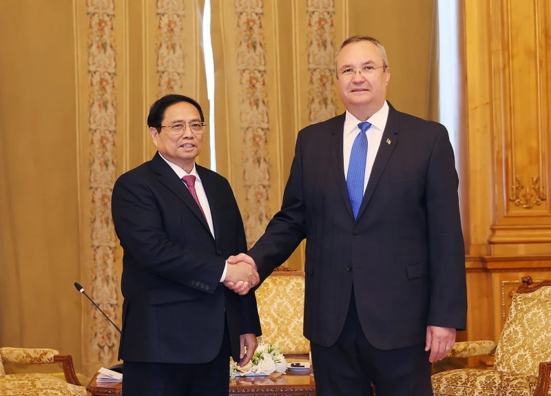 Thủ tướng Phạm Minh Chính hội kiến Chủ tịch Thượng viện Romania Nicolae Ionel Ciuca. (Ảnh: Dương Giang/TTXVN)
