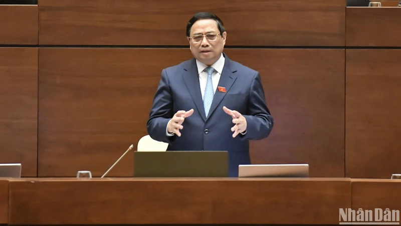 Thủ tướng Phạm Minh Chính trả lời chất vấn của đại biểu Quốc hội. (Ảnh: ĐĂNG KHOA) 