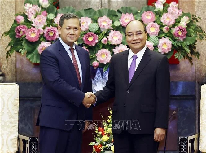 Chủ tịch nước Nguyễn Xuân Phúc đã tiếp Đại tướng Hun Manet, Phó Tổng tư lệnh kiêm Tư lệnh Lục quân Quân đội Hoàng gia Campuchia. (Ảnh: Thống Nhất/TTXVN) 