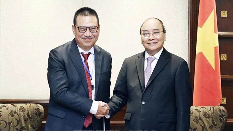 Chủ tịch nước Nguyễn Xuân Phúc tiếp Chủ tịch kiêm Tổng Giám đốc Tập đoàn SCG Roongrote Rangsiyopash. (Ảnh: Thống Nhất/TTXVN)