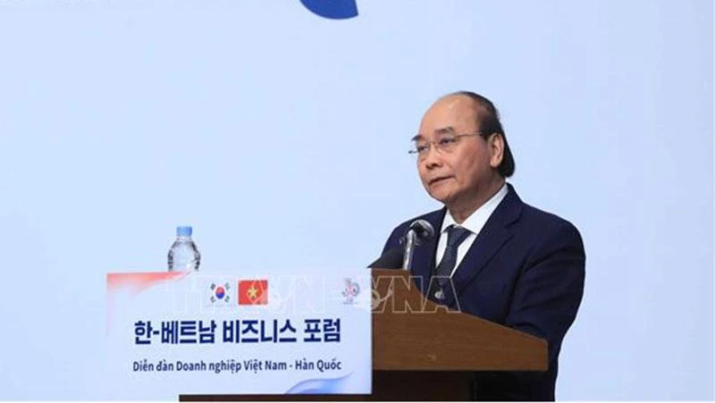 Chủ tịch nước Nguyễn Xuân Phúc phát biểu tại diễn đàn. (Ảnh: Thống Nhất/ TTXVN)